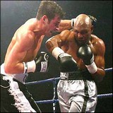 Calzaghe stoppar Mitchell í 2. lotu